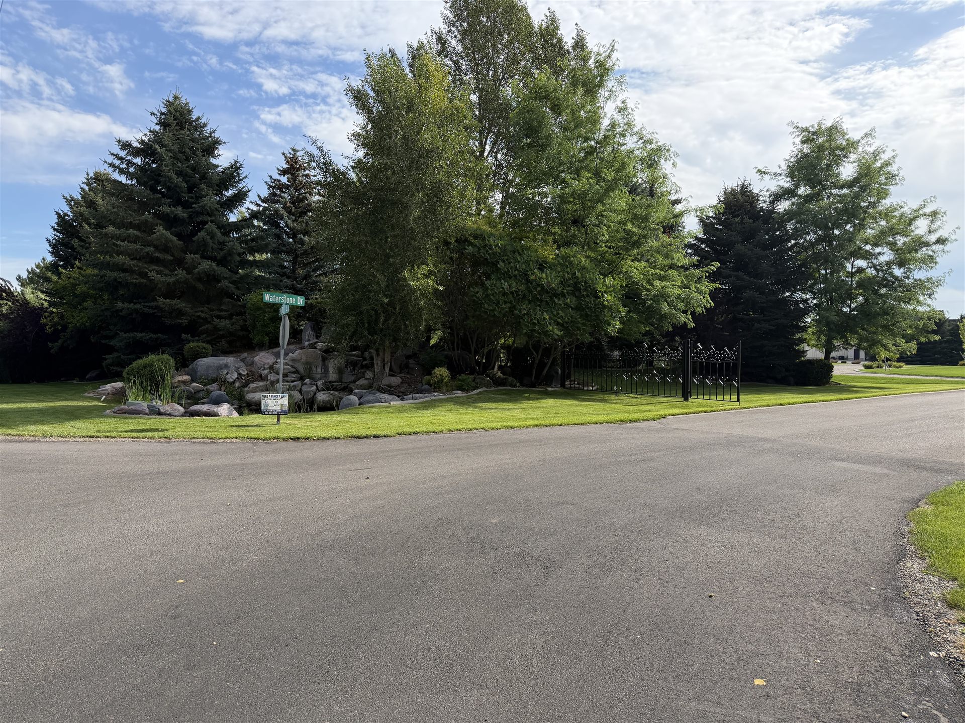 Waterstone — the entrance at Waterstone Dr, beside Rigby Lake